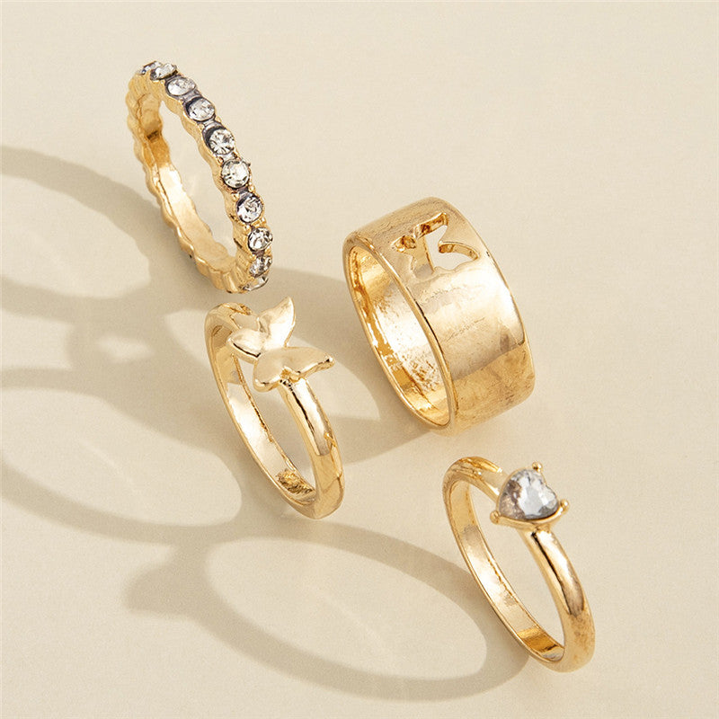 Conjunto de quatro peças anel feminino com strass e borboleta vazada Love Joint Ring